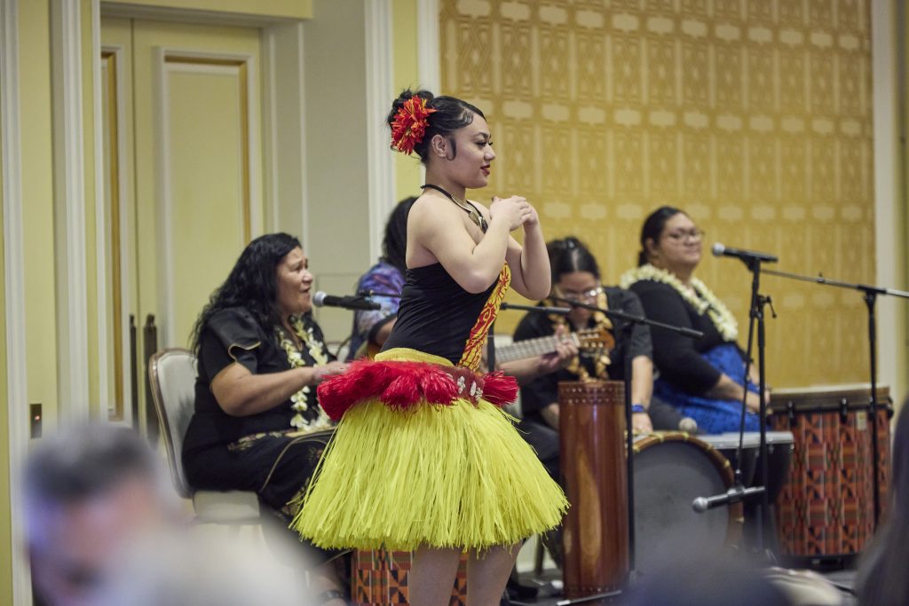 Female performer dancing in a musical performance at the 2024 UMBA Awards and Scholarship Banquet held at Little America Hotel
