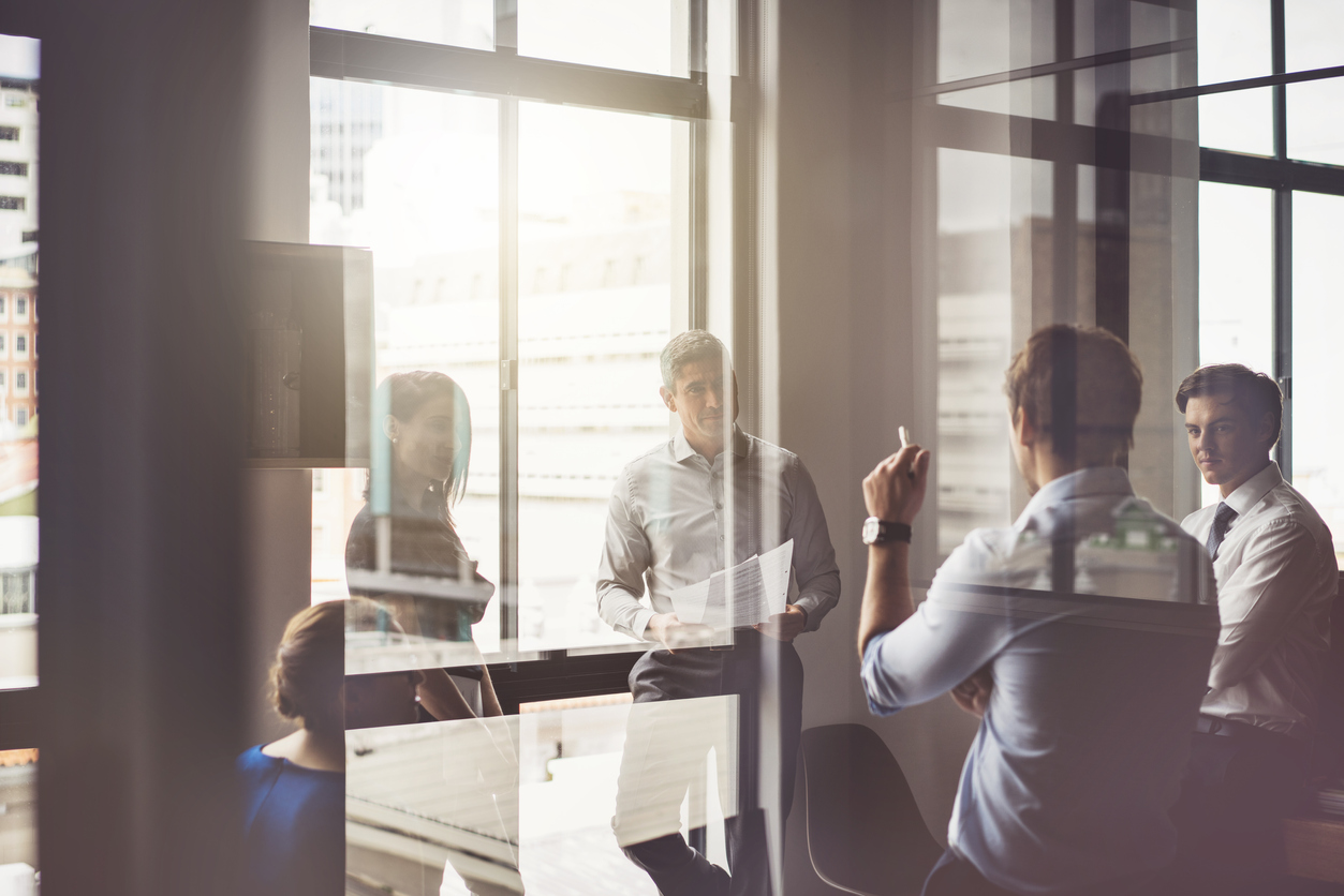 Business people having discussion in board room